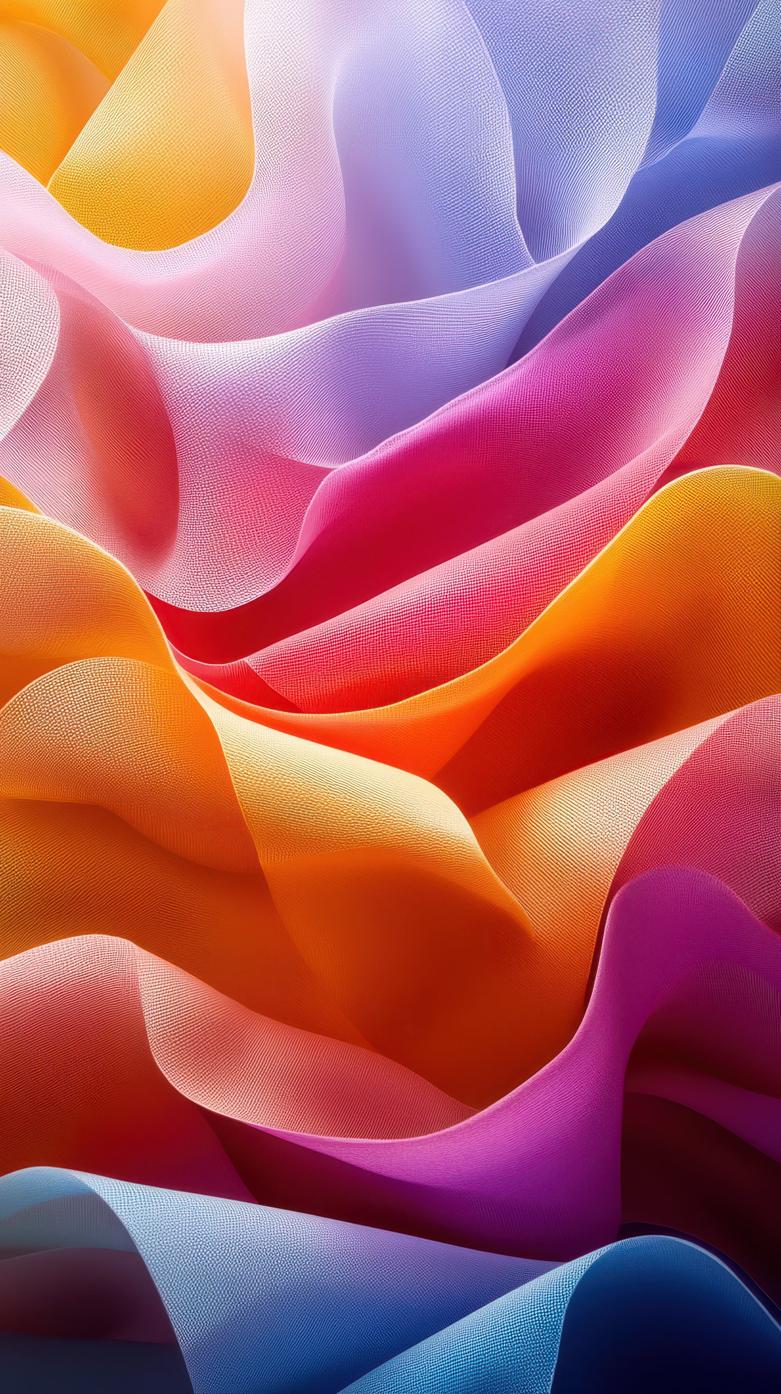 Colorful fabric waves display vibrant hues in a flowing composition illuminated by soft light